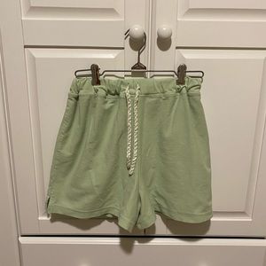 light green sweat shorts